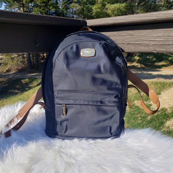 Michael Kors Handbags - ❌SOLD❌Pre-Owned Michael Kors backpack navy blue